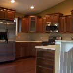 Kitchen in a custom Rosewood Kitchen in a custom Rosewood