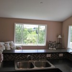 Kitchen looking into the Living Room  (Picture is of a similar condo)